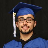 GradFest man takes photobooth headshot